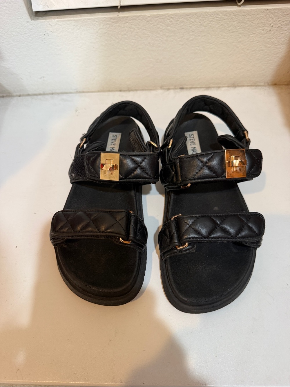 Steve Madden woman’s Black Quilted Strap Sandals with Gold Buckle